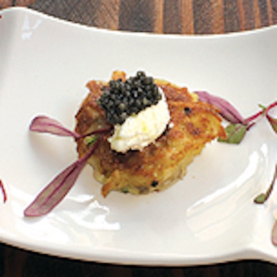 Blackfoot Catering's latke crab cakes with crème fraîche and caviar.