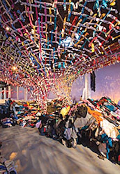 Discarded jeans and colorful shirts created a canopy for seating and a DJ booth at Los Angeles's Museum of Contemporary Art.