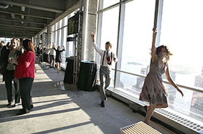 Members of the Guerilla Dance Team mingled in the 700-strong crowd during cocktails, stepping and swinging in a choreographed line.