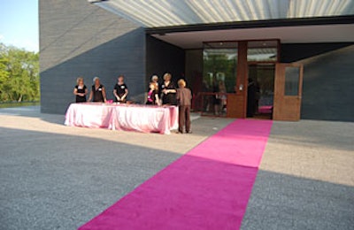 A hot-pink carpet marked the entrance to the event.