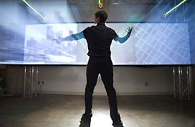 Gesture Studios ' GoodPoint system allows presenters to use their hands to move through screens of graphics and data.
