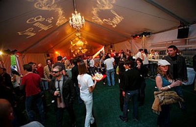 Fake grass lined the interior of the tent, while chandeliers and Diesel gobos decorated its ceilings.