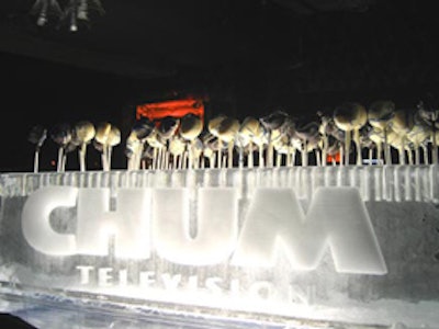 An array of cheesecake lollypops from Catering by David's adorned the top of a large white ice sculpture emblazoned with the CHUM Television name at This Is London during CHUM's upfont presentation.