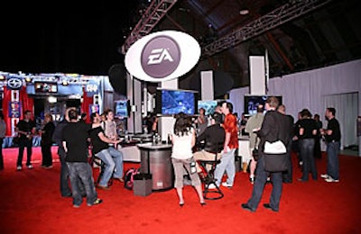 E3 attendees tested video games at the software showcase at Barker Hangar.