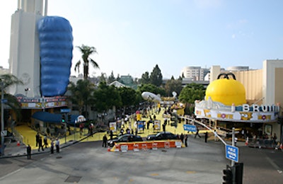 Giant balloon replicas of Marge's hair and Homer's head topped movie theaters.