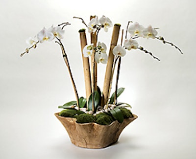 Rolling Greens instructs guests in the art of floral arrangement.