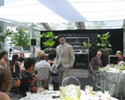 Hugo Boss models sported new fall fashions in the dining tent during the Hugo Boss luncheon celebrating the 'Hugo Boss II ' open 60 competitive sailboat at the Power Plant Contemporary Art Gallery.