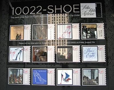 The store's windows feature the stamp designs and some of the shoes available in the new salon.