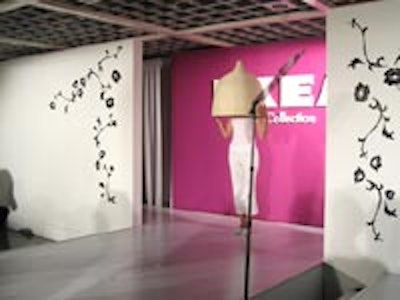 A model sporting a wicker lampshade posed on the runway at the IKEA Etobicoke for the media launch of the 2008 IKEA catalogue.