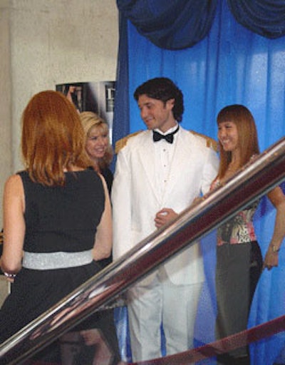 Complimentary pictures with Prince Charming and samples of 'Midnight Passion ' fragrance were provided at the Christian Dior exhibit area.
