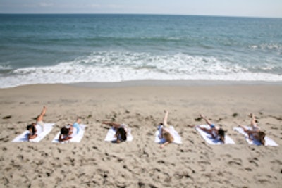 Pilates on the beach at the LG house.