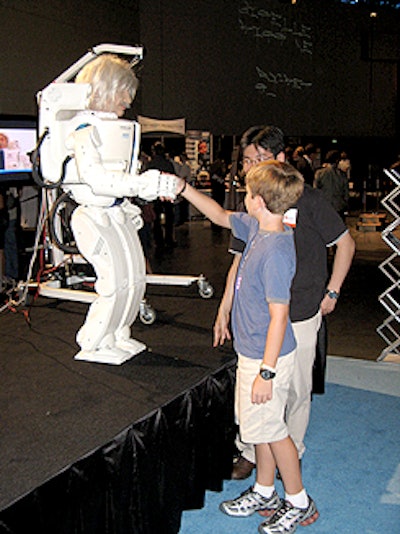 A robot shook hands with a NextFest-goer.