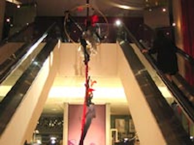 Designer Nicholas Pinney suspended nude aerialist mannequins on ropes hung from the ceiling at Holt Renfrew's Bloor Street store for the launch of Sienna and Savannah Miller's Twenty8Twelve label in Canada.