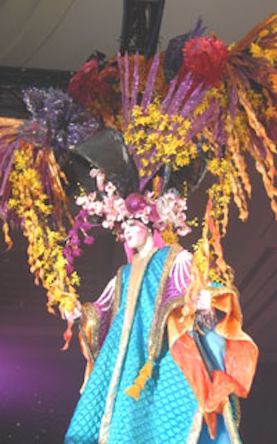 B-Wear Costumes of Orlando was the evening's winner with their geisha-inspired headdress incorporating orchids and other exotic flowers, as well as Asian influences.