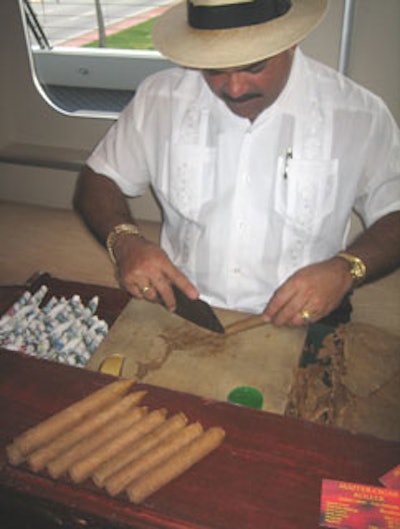 Hand-rolled cigars were made in front of guests on the middle deck of the Biscayne Lady, as they sipped cocktails and enjoyed the yacht's lounge area.