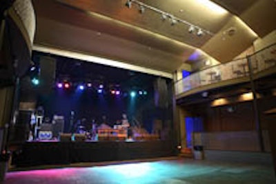 The music room has a large stage and 28-foot-high ceilings.