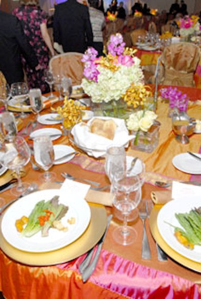 AB Cover Designers and Dream Occasions used brightly colored linens and five-piece floral centerpieces to remind guests of the gala's tropical locale.