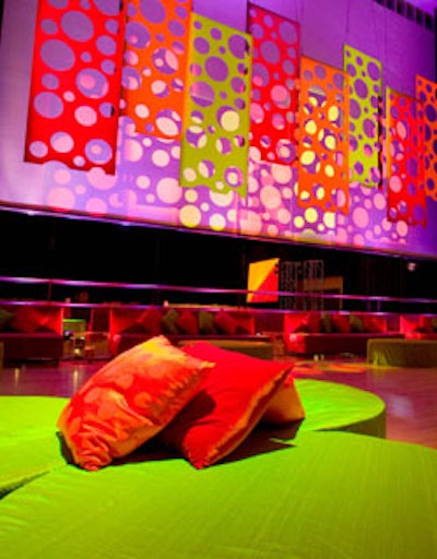 For the after-party, the rehearsal studio was turned into a hip lounge and dance club with the addition of neon green and red couches, draping, and accessories.