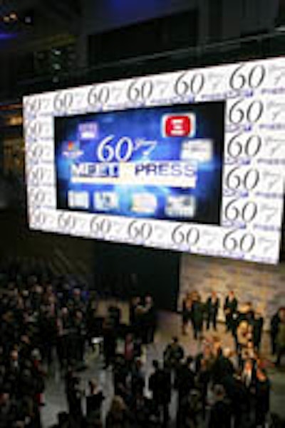 A giant screen in the Newseum atrium reminded guests why they were at the event.