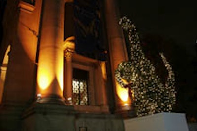 The entrance to the museum, complete with holiday dinosaur topiaries.
