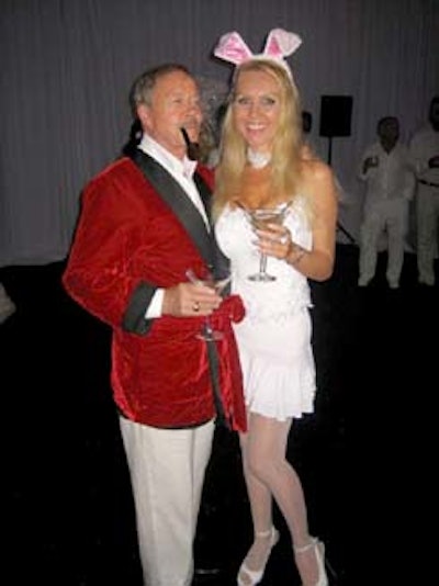 Some guests took full advantage of the costume ball, arriving as Hugh Hefner and a Playboy bunny.