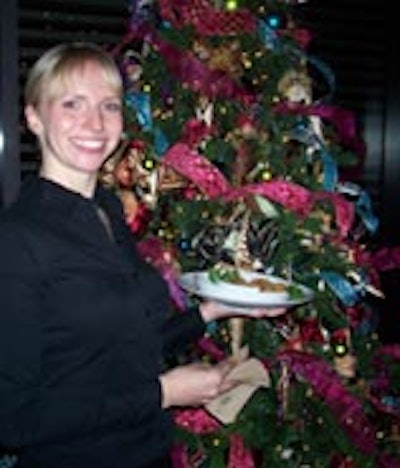 Caiterwaiters from Jamie Kennedy Kitchens passed hors d 'oeuvres at the 19th annual First Light gala and tree auction fund-raiser at the Gardiner Museum.