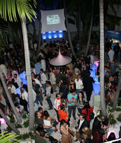 After perusing the exhibit, guests gathered in the Palm Court Building's courtyard and to dance to the sounds of DJ Ray Milian.