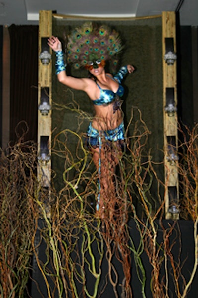 Under the creative direction of Michael Stern, peacock-inspired dancers, provided by New Century Dance Company, performed throughout the event.