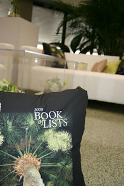 Bold black pillows featuring the Book of Lists ' cover art were another way conceptBAIT was able to keep guests ' attention on the star of the evening.
