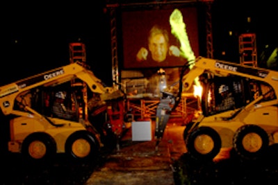 Conductor Michael Tilson Thomas directed construction equipment in sync with music and a pyrotechnic finale for the groundbreaking ceremony.