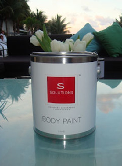 S Solutions products-such as its rejuvenating and toning body paint-were littered throughout the cocktail area.