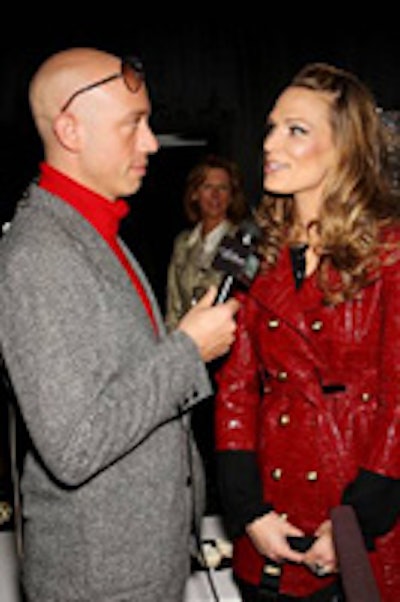 Host Robert Verdi and Molly Sims