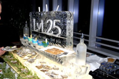 An ice sculpture bearing the name of the venue kept raw oysters and a selection of sauces cool all night.