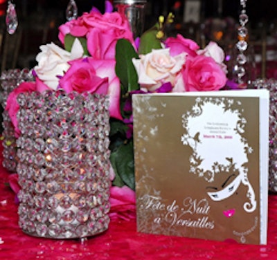 Centerpieces of roses and bejeweled candleholders decorated the tables at the 'Fete De Nuit a Versailles ' event.