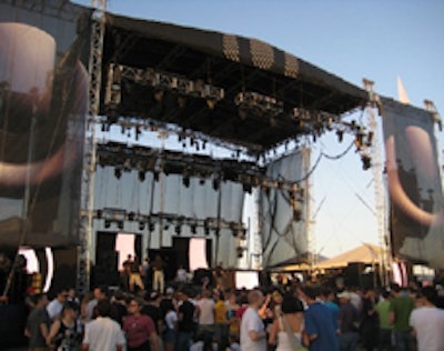 Festival attendees relaxed in front of the main stage between performances.