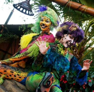 Street performers in brightly colored costumes entertained guests as they mingled throughout the attractions.