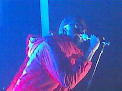 A cell phone pic of Kanye West performing at the Adult Swim party
