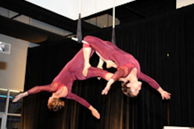 Trapeze artists performed at the grand opening of the Equinox Fitness Club in Tysons Corner.