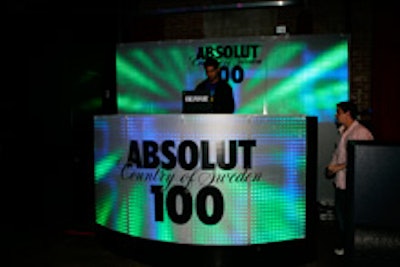 The glowing DJ booth at Absolut 100's postconcert party