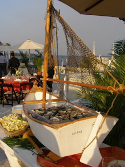 Fresh oysters inside a sailboat ornament enticed guests as they arrived.