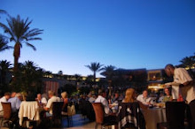 CEMA attendees at a poolside dinner Monday night