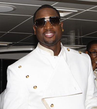 Event host and gold medal-winner Dwyane Wade arrived via yacht to Nikki Marina.