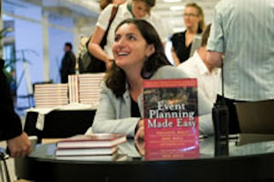Jodi Wolf of Paulette Wolf Events and Entertainment signed copies of her book.