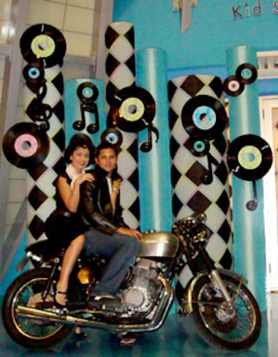 An antique motorcycle parked in the lobby of the museum provided a photo op for guests.