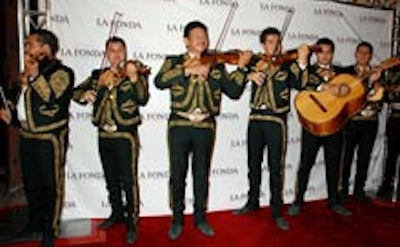 Mariachi Monumental de America performing at the reopening party