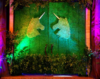 The ballroom doors were adorned with greenery and unicorn images to channel the enchanted-forest ambience.