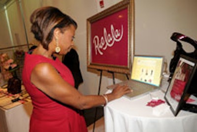 Star Jones perusing the silent auction items.