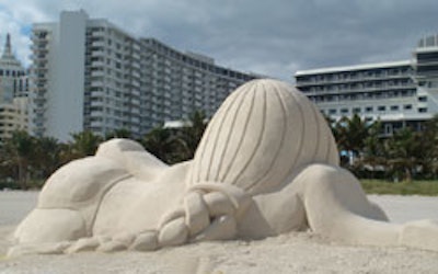 Swiss artist Olaf Breuning's 150-ton sphinx sand sculpture as it looked from behind.