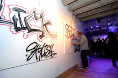 A graffiti artist at the Blackberry Storm launch