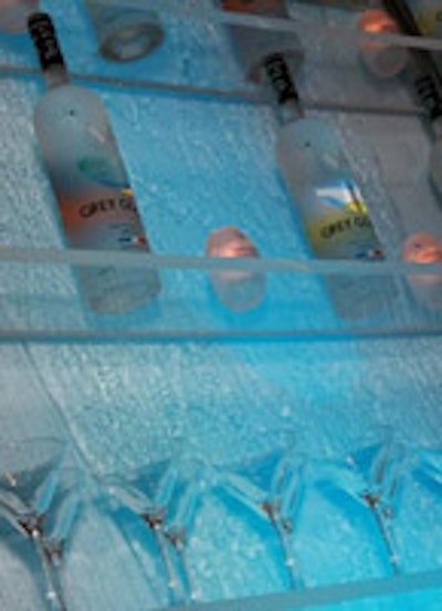 The Water Bar features running water over a surface made from projection screen material.